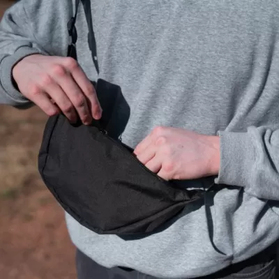 Crescent AWARE™ RPET half moon sling bag